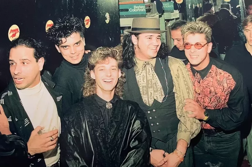Road manager Joe Blanco, Rudy Gil, keyboardist Doug Emery, Frank Lords, and saxophonist Bobby Martinez backstage at Casanova's nightclub in Hialeah in 1989. - PHOTO BY VICTOR JINETE