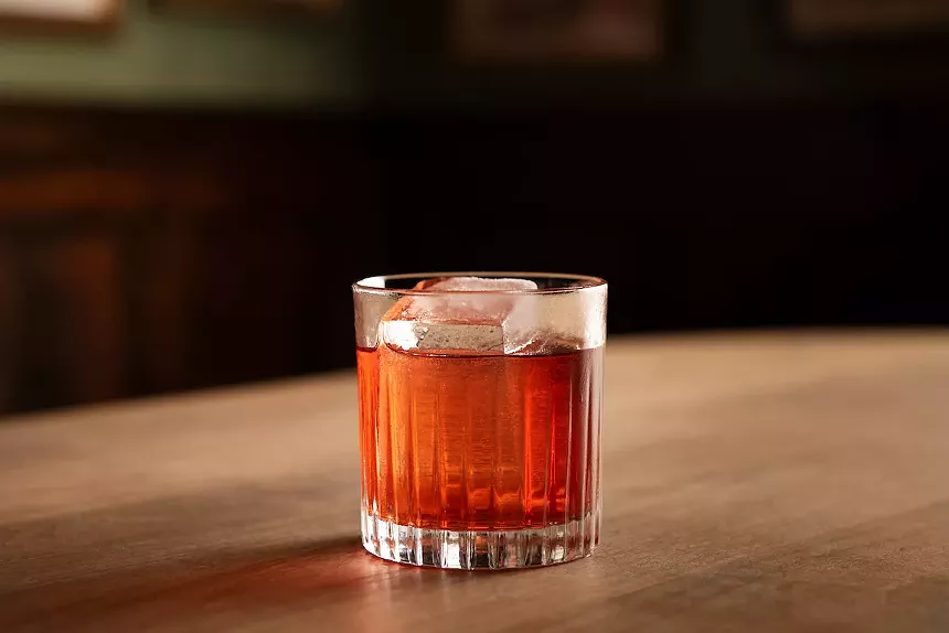 The Dead Rabbit's "Red Alert" is a combination of single-malt Scotch, rhubarb amaro, lychee liqueur, bitter aperitif, tart cherry, and Peychaud's bitters. - PHOTO COURTESY OF JILLIAN VOSE