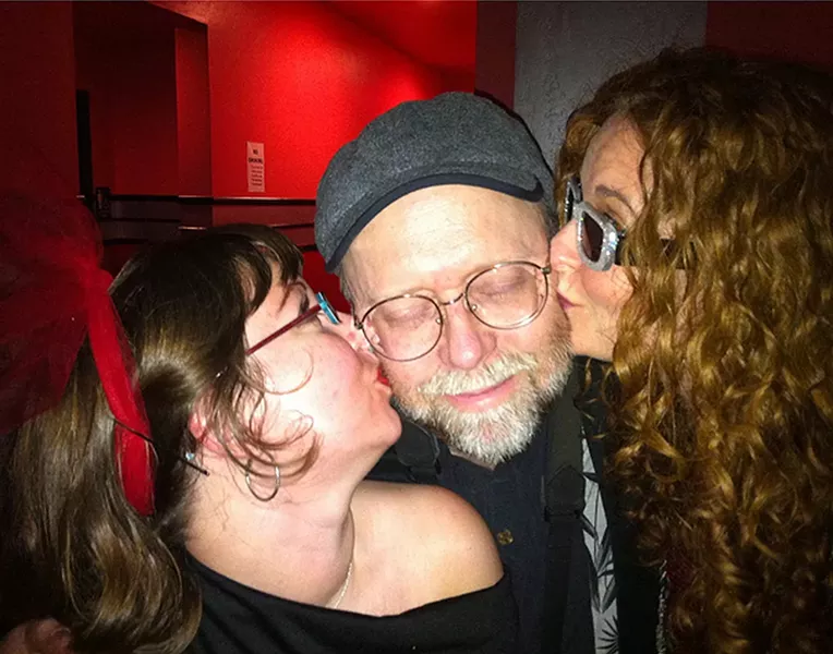 A blissful Kevin Hoover smootched by a pair of Eye Dolls - PHOTO BY BOB DORAN