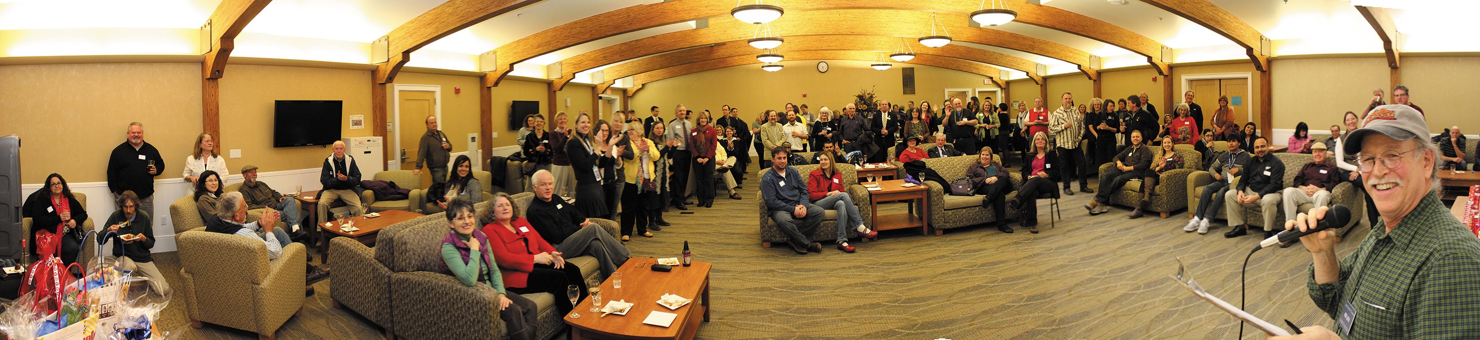 Arcata Chamber of Commerce President Rick Levin introduces guests at a mixer held in the Great Hall on the Humboldt State University campus, on Feb 6. - PHOTO BY BOB DORAN
