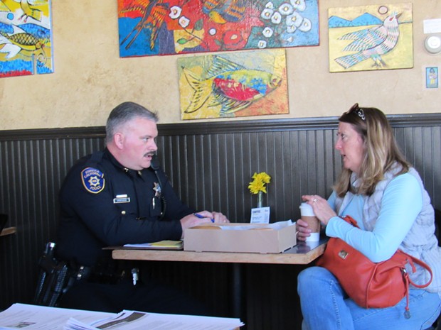 Capt. Brian Stephens of the Eureka Police Department takes notes. - LINDA STANSBERRY
