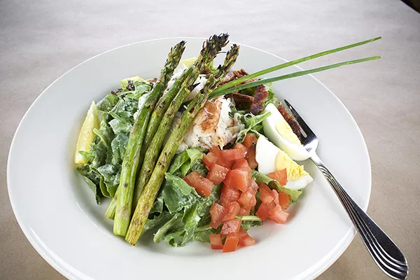 Dungeness salad with bacon, avocado, grilled asparagus, heirloom tomatoes and scallion cream at Moonstone Grill. - PHOTO BY ROCKY ARROYO