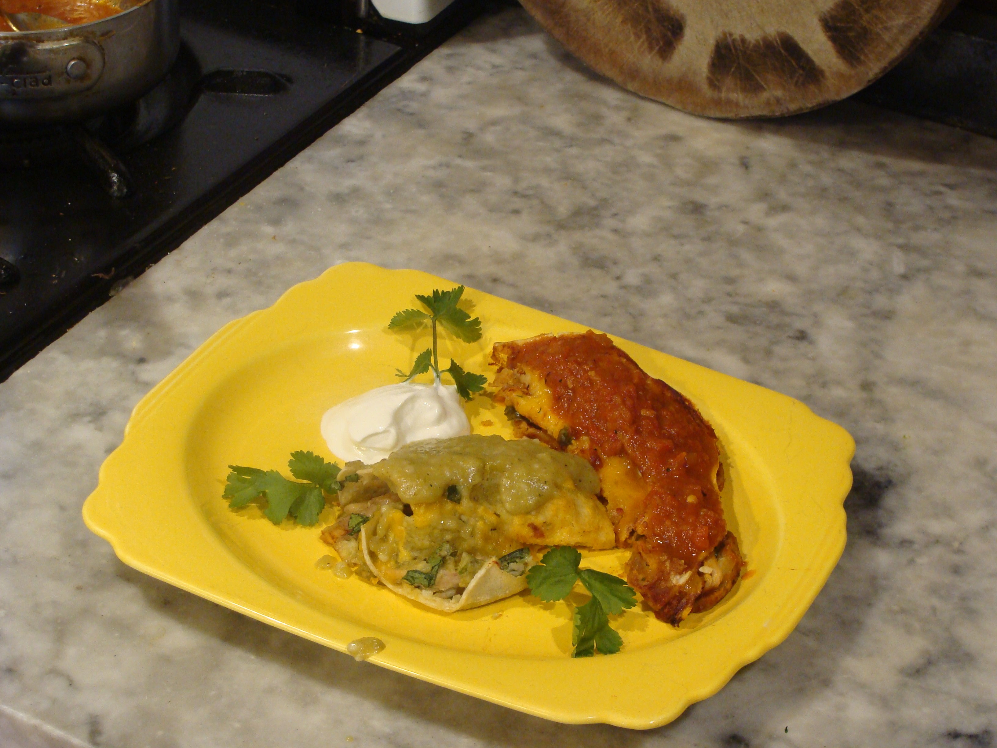 Enchiladas with Arno's green sauce and Max's red sauce. - PHOTO BY DARIUS BROTMAN