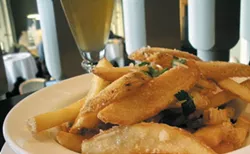 PHOTO BY JENNIFER FUMIKO CAHILL - Fancy truffle fries at the Carter House bar.