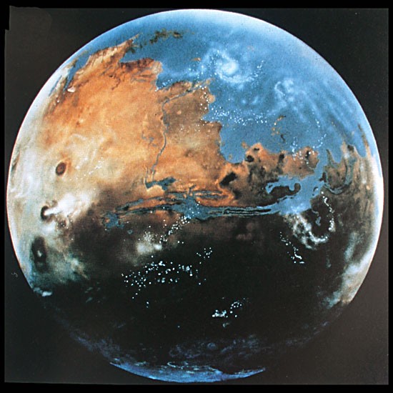 How Mars might have looked four billion years ago, with oceans and active volcanoes. (From Barry Evans' book The One-Way Comet, painting by Michael Carroll.