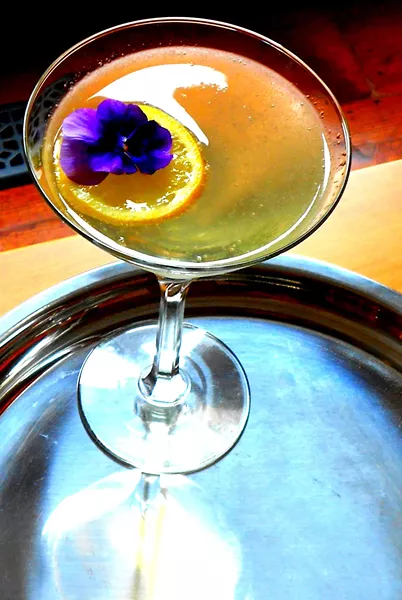Lemon Drop with pansy garnish - PHOTO BY AMY STEWART
