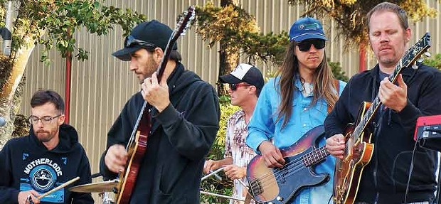 Members of Motherlode play some funk for the crowd at the Humboldt County Fair Saturday, Aug. 23. despite being misidentified in the program as a "country" band called "Mother Lode." - PHOTO BY BOB DORAN