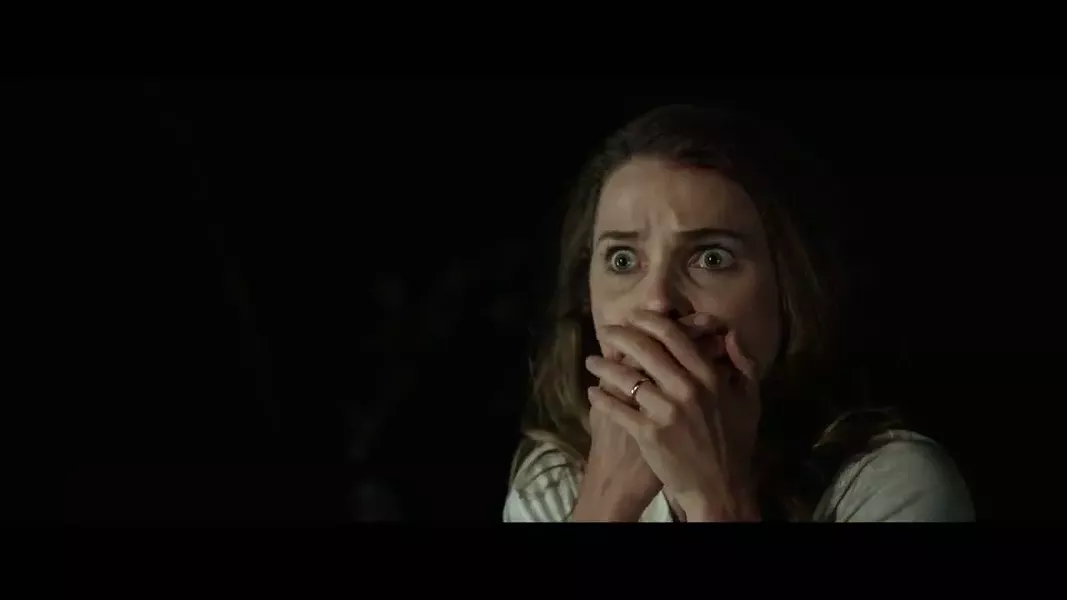 "Oops, I swallowed the flashlight!" Keri Russell in Dark Skies.