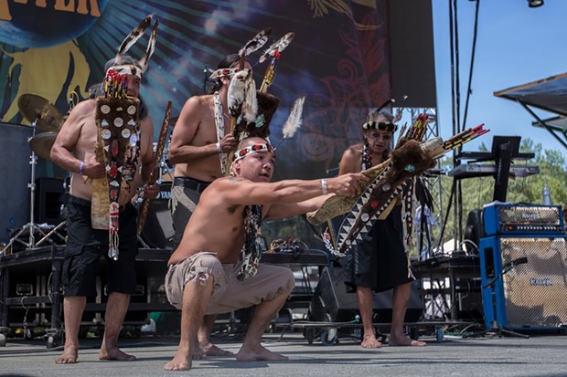 Karuk and Yurok men demonstrate a brush dance at the 30th Annual Reggae On The River 2014, Friday Aug.1. - ALEXANDER WOODARD