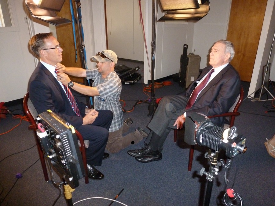 Rep. Huffman (left) getting primped for his interview with Dan Rather. - RYAN BURNS