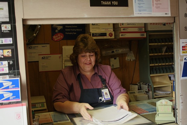 Shari Creps has been working at the Korbel post office for 13 years. It's the last remnant of a formerly booming town, she said. - ZACH ST. GEORGE