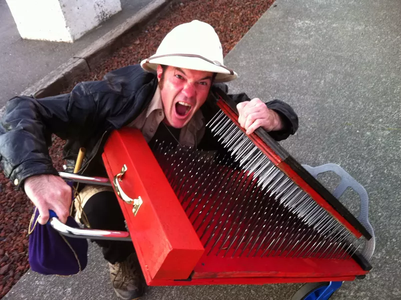 Shea FreeLove with his bed of nails - PHOTO BY BOB DORAN