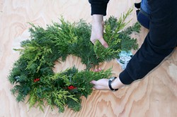 PHOTO BY GENEVIEVE SCHMIDT - turn your winter prunings into a gift wreath.