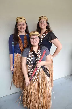 Dancers Kayla Begay (left), Viola "Chummy" Brooks and Stephanie Lumsden (front) with Flower Dance sticks at a demonstration at the California Indian Big Time and Social Gathering at Humboldt State University. - PHOTO BY CUTCHA RISLING BALDY