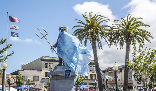 McKinley, whose fate was sealed in 2018, stands sentry over the plaza, clad in Poseidon's robes, for Oyster Fest. - MARK LARSON