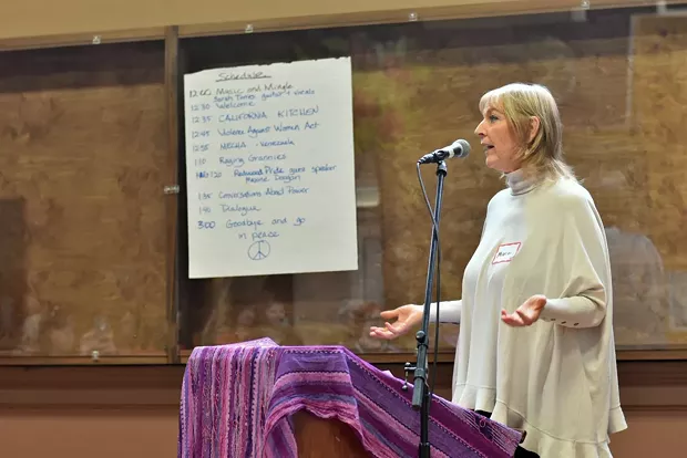 Sex worker activist Maxine Doogan tells the Womxn Conference about how sting operations allow police to engage with sexual contact with sex workers before arresting them. - PHOTO BY MEGAN BENDER