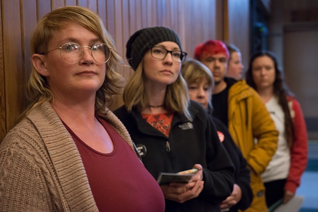 Jill Larrabee, left, waits to speak at the Arcata City Council meeting regarding the Josiah Lawson case and joined others in calling on city officials to call the DOJ or another outside agency to assist the investigation. - MARK MCKENNA
