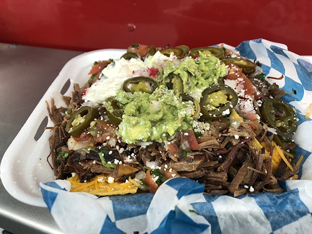 Brisket nachos for the hungry or social. - PHOTO BY JENNIFER FUMIKO CAHILL