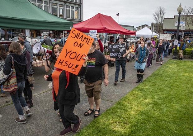 Demonstrators unhappy with the firing of KHSU staffers and the suspension of local programming gathered into a protest walk around the farmers market area. - PHOTO BY MARK LARSON