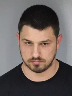 Mug shot of Evgeni Kopankov, one of the three men accused in the heist plot. - SUBMITTED