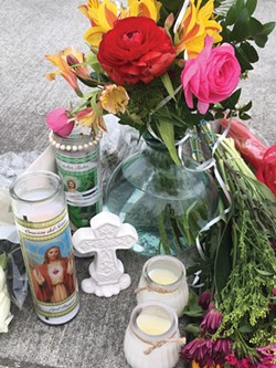 A memorial at the shooting site. - KIMBERLY WEAR