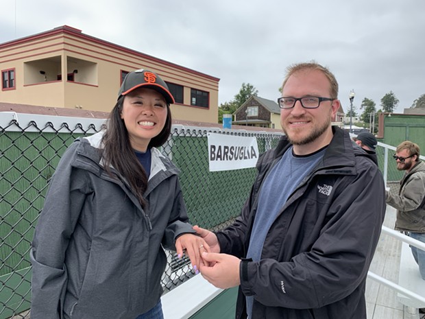 Kyle Zahradka and Joyce Eng got engagement at Saturday's game. - SUBMITTED