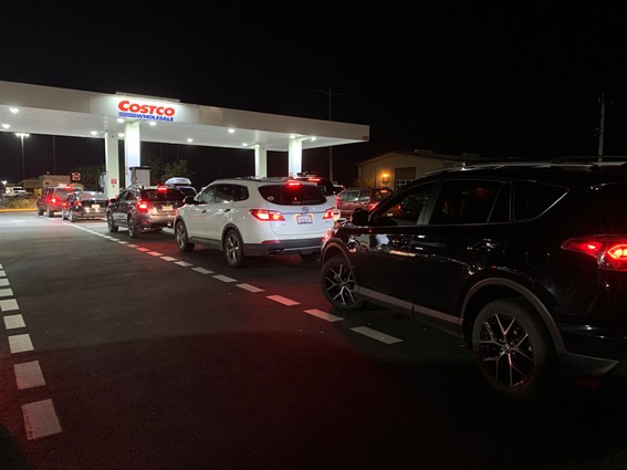 The line for gas at Costco in Eureka stretched out of the parking lot and around the block Tuesday evening. - MARK MCKENNA