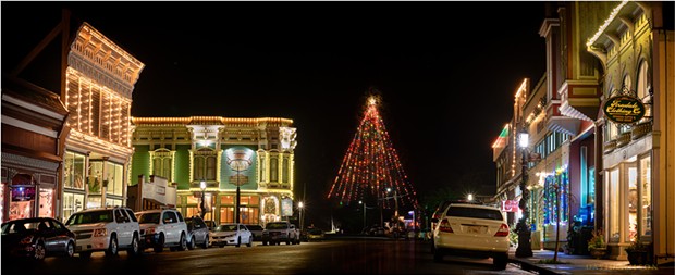 Festive lighting and Ferndale’s great Christmas tree lent holiday vibes to Ferndale’s Main Street. My wife kept a lookout for cars while I captured the image. December 19, 2019 in Humboldt County, California. - DAVID WILSON