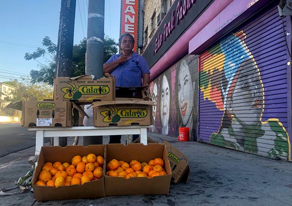 Carlos Perez-Vasquez has sold fruit and flowers on the streets of Echo Park for 20 years. - NIGEL DUARA FOR CALMATTERS