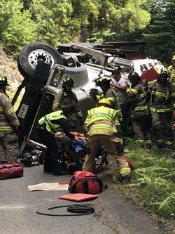 A logging truck flipped on Kneeland Rd. - SUBMITTED