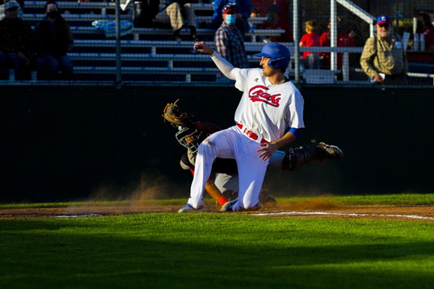 Humboldt Crabs catcher Andrew Allanson (#22) slides into home to score in the bottom of the 1st inning on opening night at Arcata Ballpark on June 4, 2021. - PHOTO BY THOMAS LAL