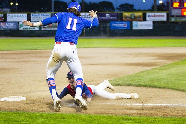 Crabs outfielder Josh Lauck (#11) attempts to scramble back to third base on June 23, 2021 while facing the Redding Tigers at Arcata Ballpark. - THOMAS LAL