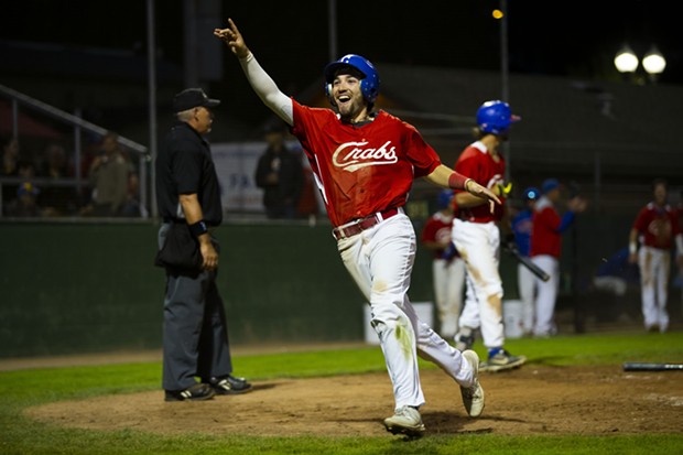 Shortstop Aaron Casillas celebrates and points to the crowd after scoring against the West Coast Kings after reaching base on a hit-by-pitch on July 16, 2021. - THOMAS LAL