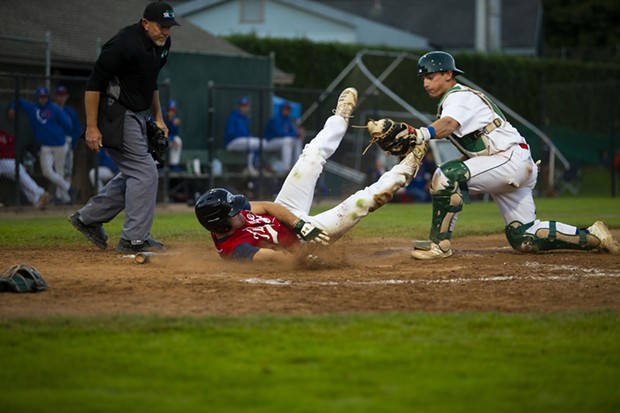 Crabs catcher Dylan McPhillips tags out a Redding Tigers runner at homeplate on July 21, 2021 on the way to a 6-4 Crabs win at Arcata Ballpark. - THOMAS LAL