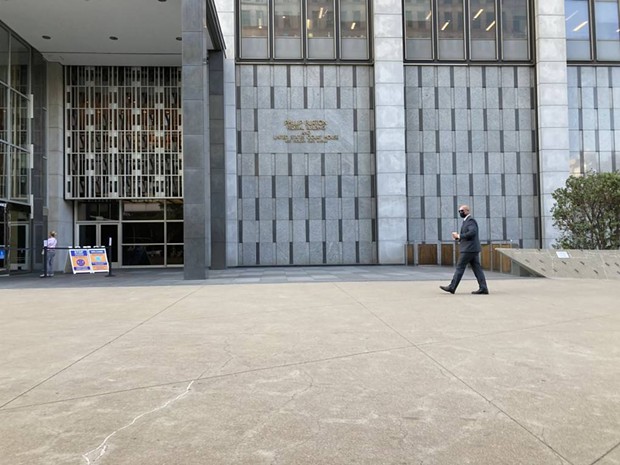 Sgt. Brendan "Jacy" Tatum walks into the Phillip Burton Federal Building and U.S. Courthouse in San Francisco. - SUKEY LEWIS/KQED