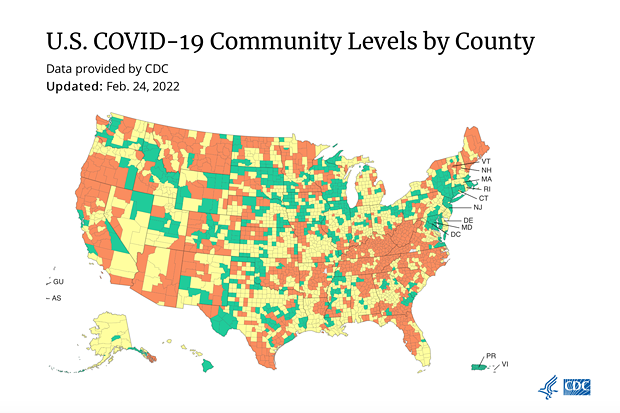 U.S. county risk levels according to the CDC's new metrics, with orange meaning "high" risk, yellow meaning "medium" and green meaning "low." - CDC