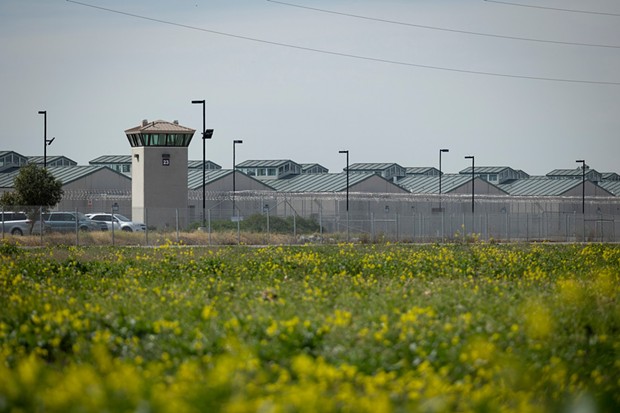 A guard tower at the N. A. Chaderjian Youth Correctional Facility in Stockton on March 2, 2022. - PHOTO BY MIGUEL GUTIERREZ JR., CALMATTERS