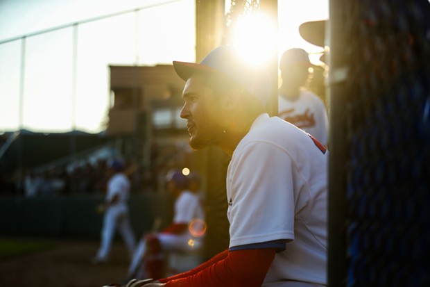 Crabs First Baseman Javier Felix sit in the dugout as the Crabs take on the Seattle Studs on June 17. - THOMAS LAL