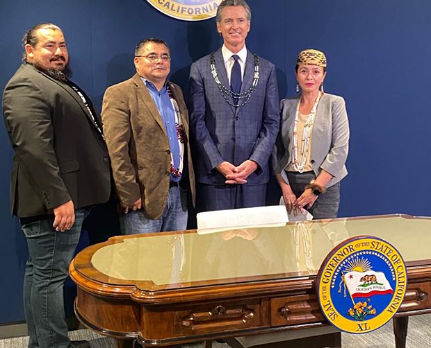 Yurok Chair Joseph L. James, Vice ChairFrankie Myers and Yurok Chief Operating Officer Taralyn Ipina join California Gov. Gavin Newsom and Assemblymember James C. Ramos for the signing of the historic Feather Alert bill. - COURTESY OF THE YUROK TRIBE