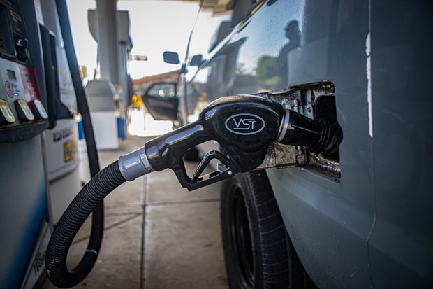 A gas nozzle in a van at a central Fresno gas station on Sept. 29, 2022. - PHOTO BY LARRY VALENZUELA, CALMATTERS/CATCHLIGHT LOCAL