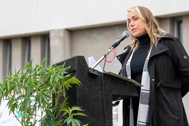 Sandi DeLuca, pictured here at a cultivation tax protest in January of 2022, was one of dozens of people who spoke in opposition of the Cannabis Reform Initiative at the March 7 meeting of the Humboldt County Board of Supervisors. - FILE PHOTOS