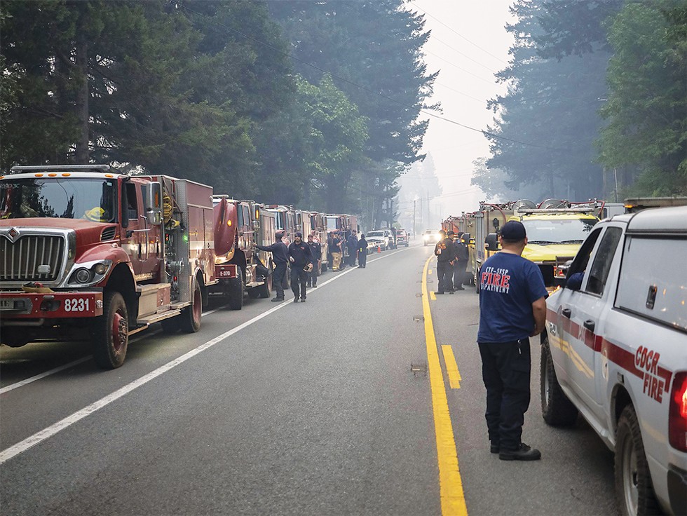 Fire engines line the roadway outside of Ward Field fire camp in Gasquet on  Aug. 24. - PHOTO COURTESY OF CALFIRE