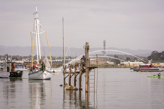 The Golden Rule was greeted on Humboldt Bay after its launching by a flotilla of boats, including the Madaket and a spray salute from a Humboldt Bay Fire boat, on Saturday, June 20 at the Zerlang & Zerlang boat yard on the Samoa peninsula. The vessel was then towed by tug to the HSU aquatic center on Eureka's water front for  public viewing and a second program about its history. - MARK LARSON