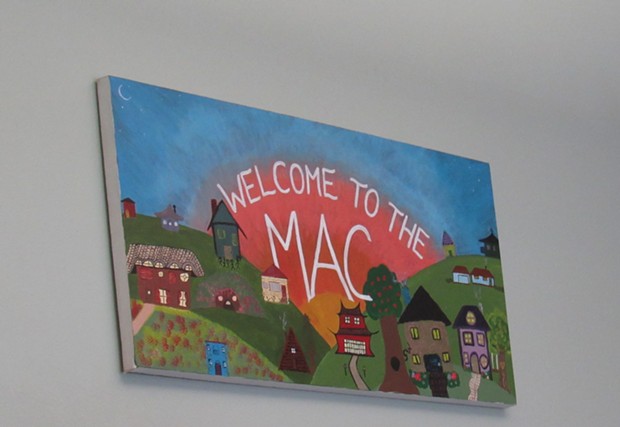 A sign welcoming visitors to the MAC. - LINDA STANSBERRY
