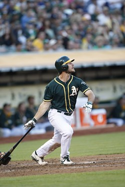 John Jaso, swinging for the Oakland Athletics. - SUBMITTED