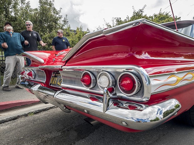 Allen Mann, of Fieldbrook (second from left), entered his 1960 Chevrolet Impala in the 12th annual Bill Nessler Car Show that followed the Annie & Mary Day parade in Blue Lake on Sunday. - MARK LARSON