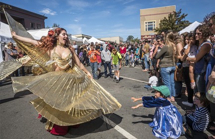 Belly dancers performed in the Samba Parade and the Ya Habibi Dance Company danced later on the plaza lawn at the North Country Fair on Saturday. - MARK LARSON