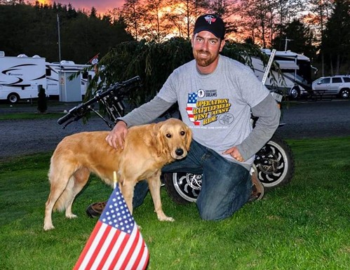 Cook and his loyal service dog, Ivy. - FACEBOOK