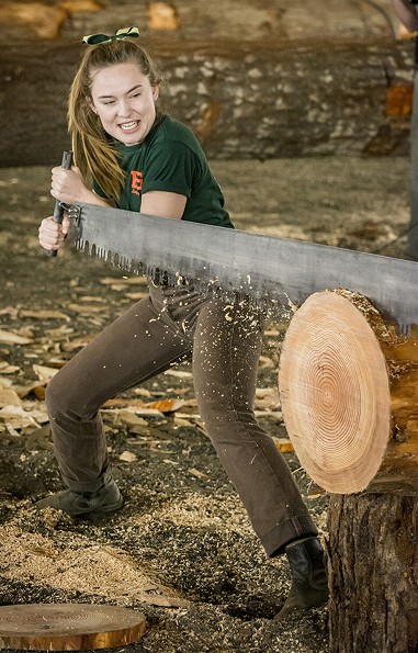 HSU Soils and Range Management major Sierra Berry, of Sacramento, handled her end of a two-person crosscut saw in the Lumberjack & Jill Show on Friday. - PHOTO BY MARK LARSON