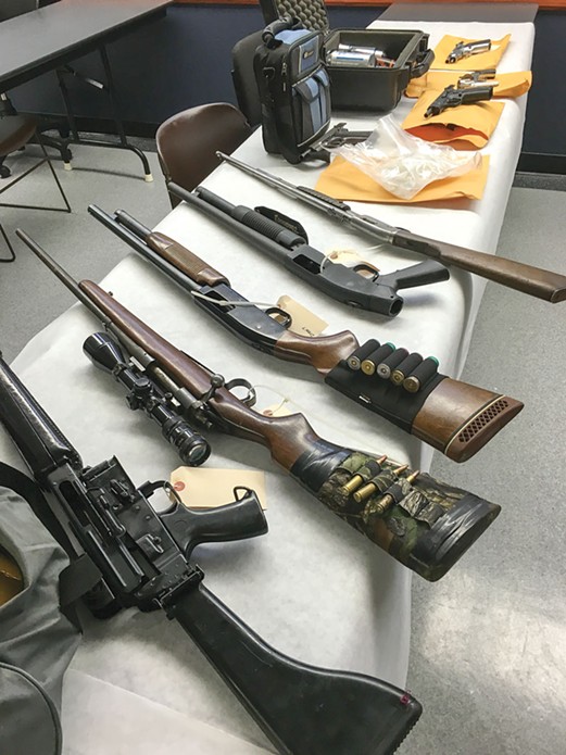 Firearms seized at the scene of a methamphetamine bust last year. - COURTESY OF EPD